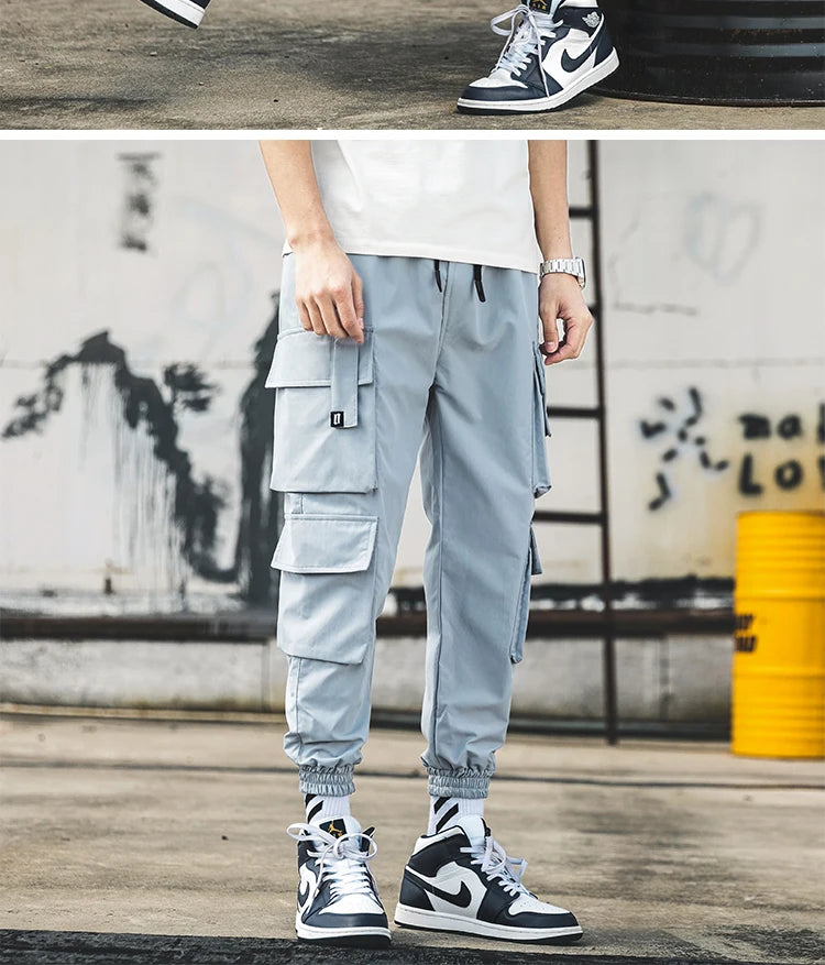 KK BRAND – Men’s Tapered Utility Trousers Effortless street style meets everyday comfort STYLE OF COLOR Black, Khaki, Light Grey, and Light Blue IN 2025