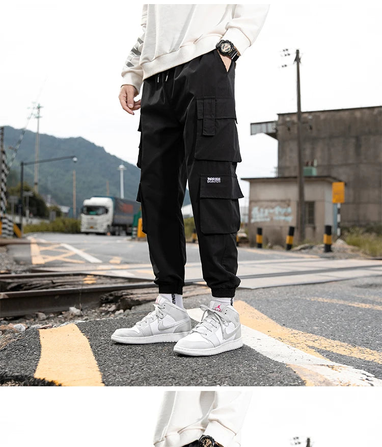 KK BRAND – Men’s Tapered Utility Trousers Effortless street style meets everyday comfort STYLE OF COLOR Black, Khaki, Light Grey, and Light Blue IN 2025