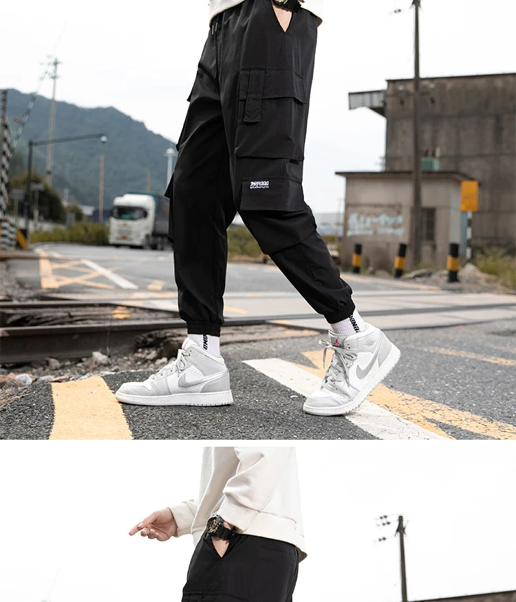 KK BRAND – Men’s Tapered Utility Trousers Effortless street style meets everyday comfort STYLE OF COLOR Black, Khaki, Light Grey, and Light Blue IN 2025